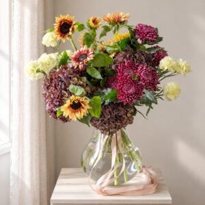 Mixed autumn bouquet with sunflowers, hydrangea and plum chrysanthemums